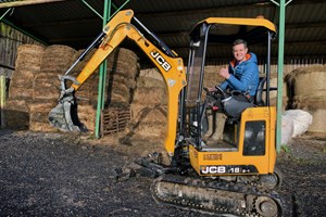 TV presenter Matt Baker at the controls of a JCB 18-Z-1 mini excavator
