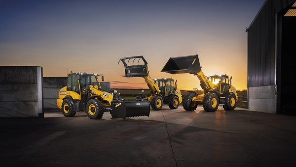 TM280S, TM320S and TM420S in a yard at sunset