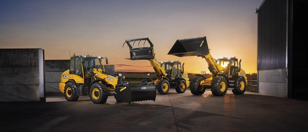 TM280S, TM320S and TM420S in a yard at sunset
