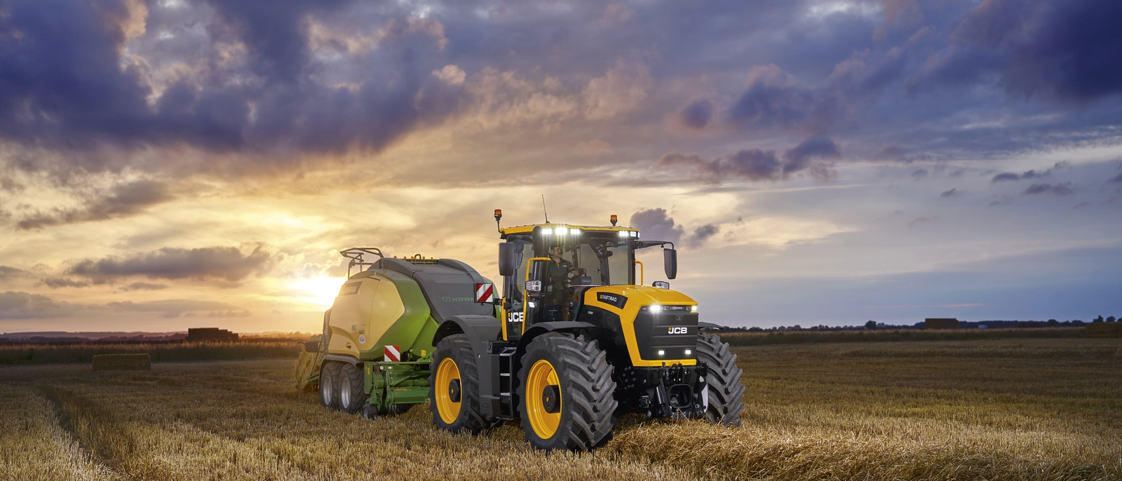 Fastrac 6000 Series - 6300 - Stage V - Baling application at sunset