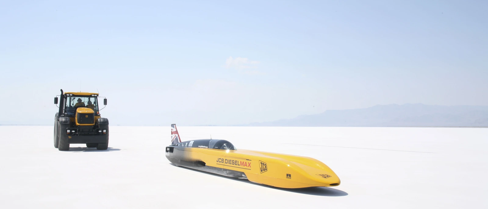 Fastrac 8250 pushing Dieselmax on saltflats