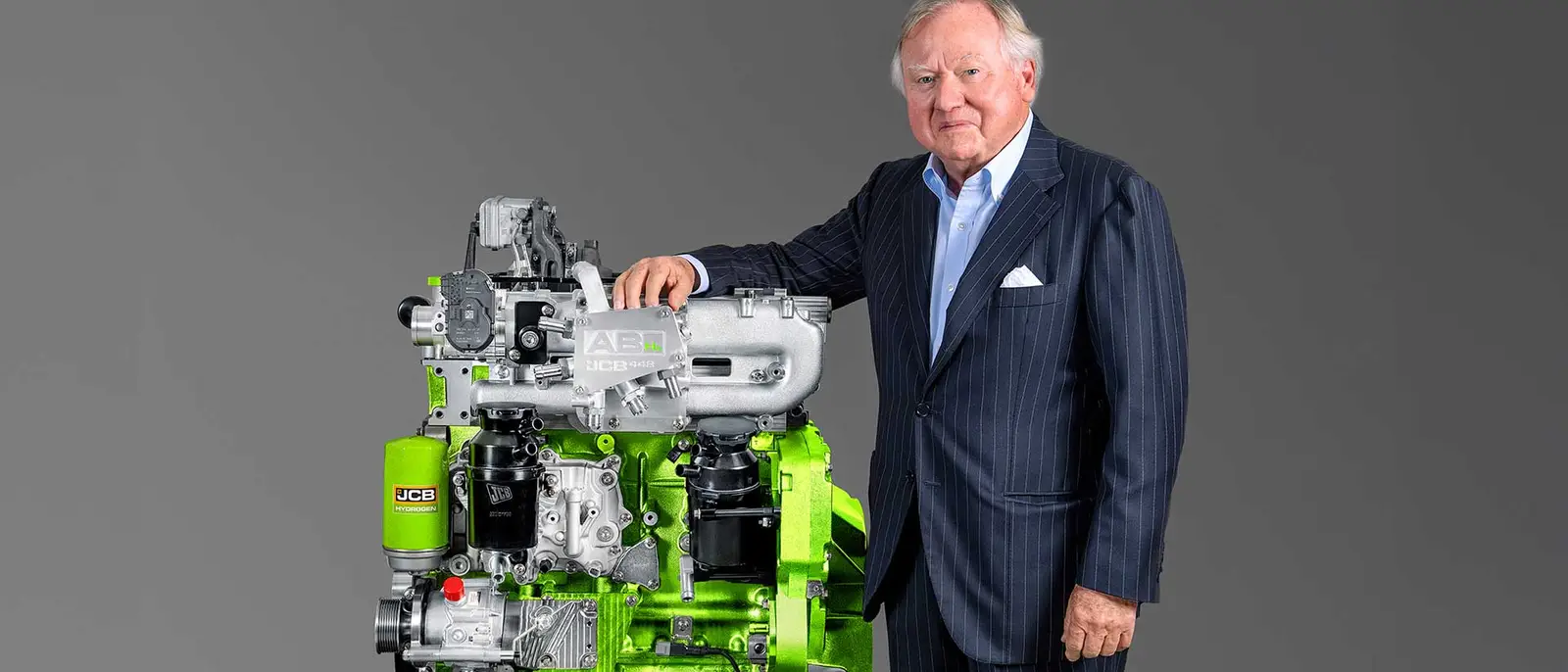 Lord Bamford with the JCB Hydrogen Engine 21x9
