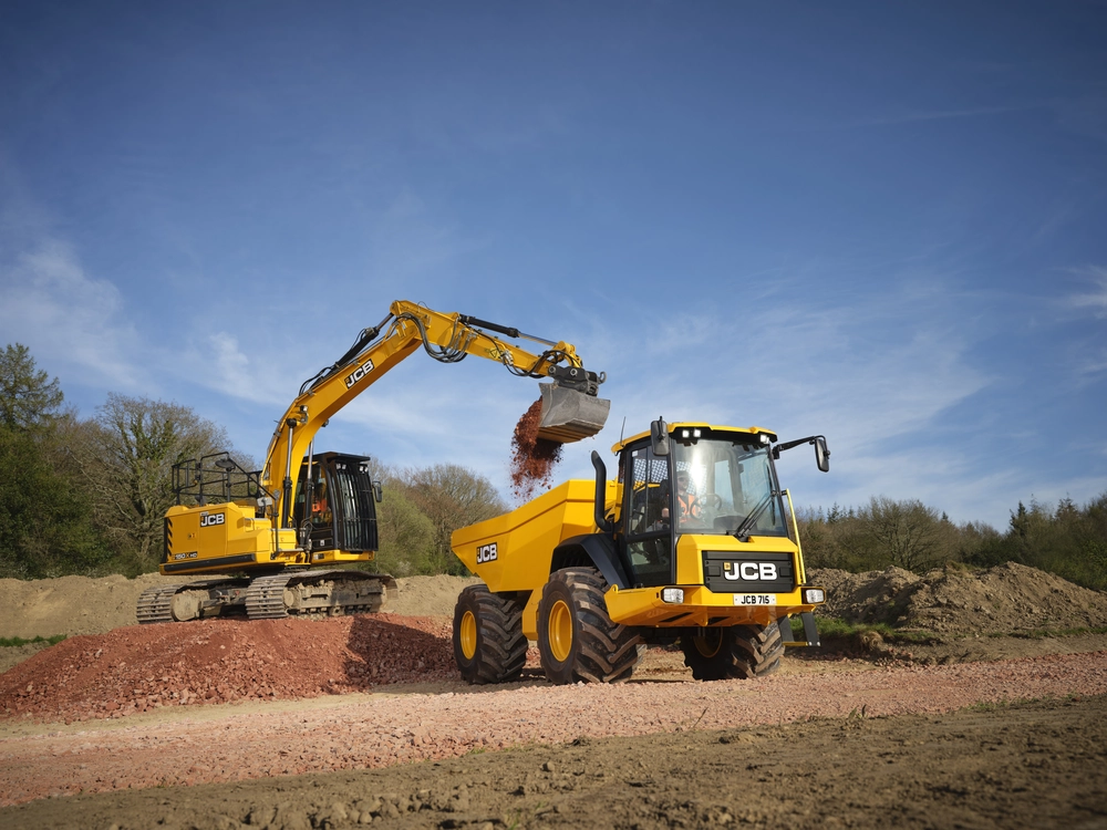 715 Articulated Dump Truck being loaded by a 150X Tracked Excavator
