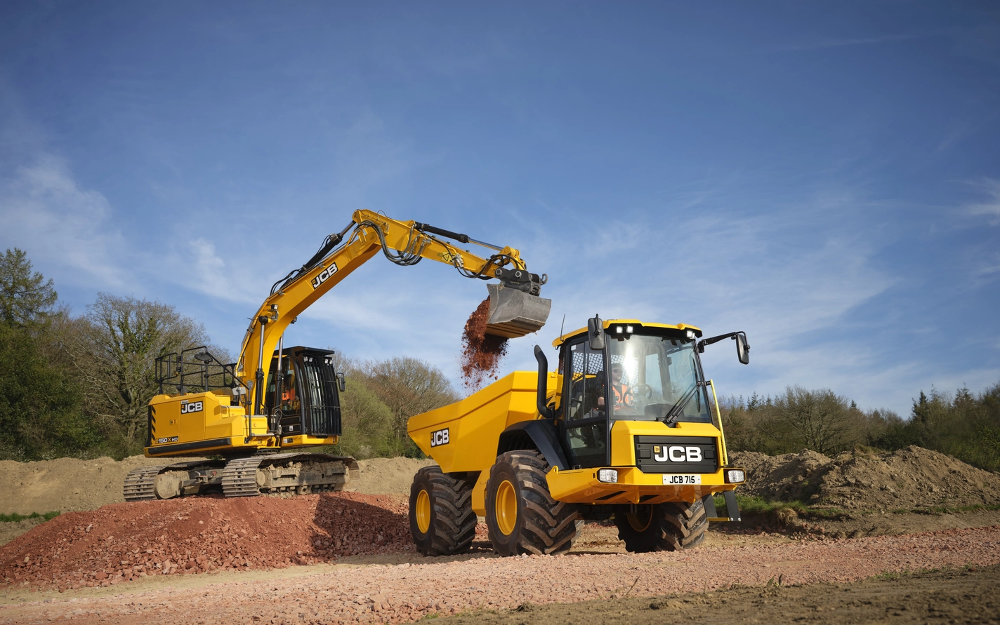 715 Articulated Dump Truck being loaded by a 150X Tracked Excavator