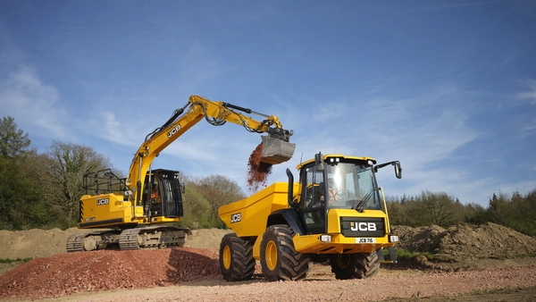 715 Articulated Dump Truck being loaded by a 150X Tracked Excavator