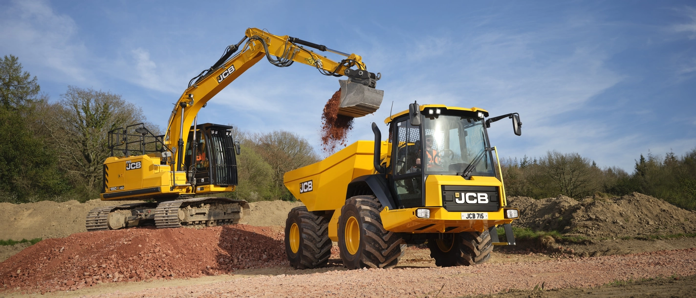 715 Articulated Dump Truck being loaded by a 150X Tracked Excavator