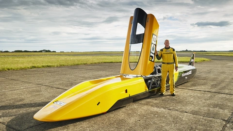 JCB Hydromax with driver Wing Commander Andy Green OBE at RAF Wittering