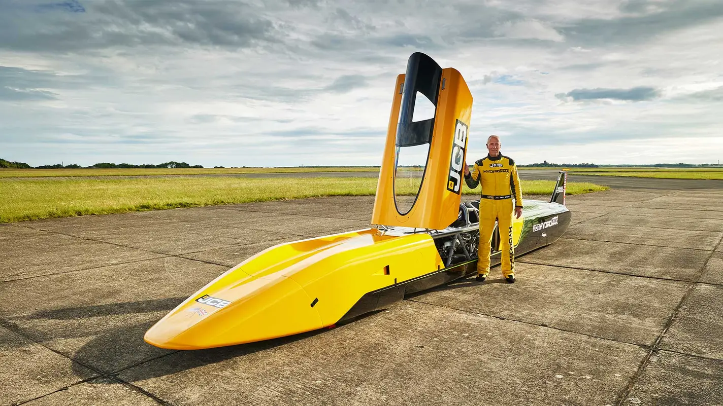 JCB Hydromax with driver Wing Commander Andy Green OBE at RAF Wittering 21x9