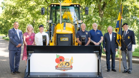 Retired firefighter digs deep for poppy appeal with JCB badge