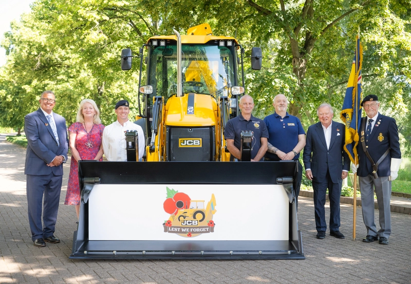 Pictured left to right at the launch are Andrew Simmill, of Rayne Engineering; Annmarie Jones of the Royal British Legion Poppy Appeal; JCB employee Karl Sutton, retired firefighter Kelvin Jones; JCB employee Tim Constantino; Lord Bamford and retired JCB employee Gil Mould of the Cheadle branch of the Royal British Legion.