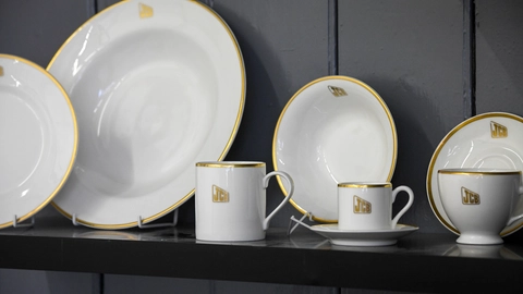 JCB branded mugs embossed with 22ct gold are being produced for the first time and will be sold, along with JCB cups and saucers.