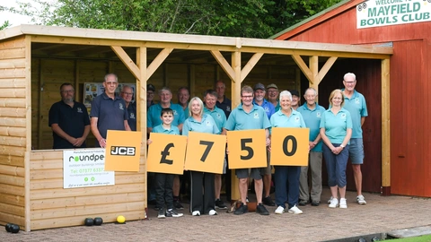 A village bowling club has two reasons to celebrate after securing funding for a new shelter and topping off a successful season.